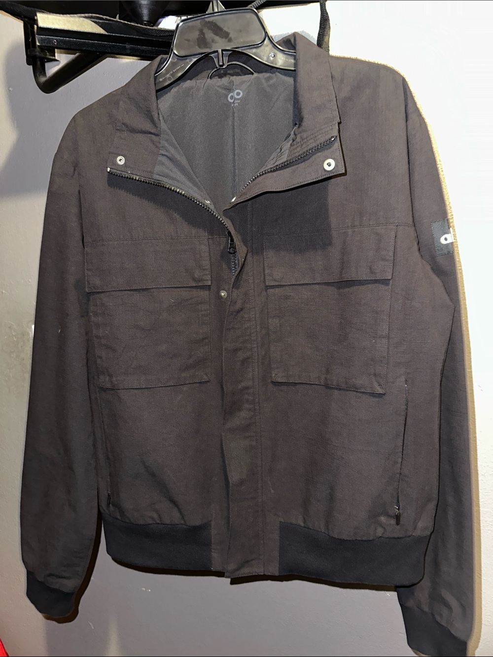 ALO Yoga Men’s Black Bomber Jacket with Subtle Trim